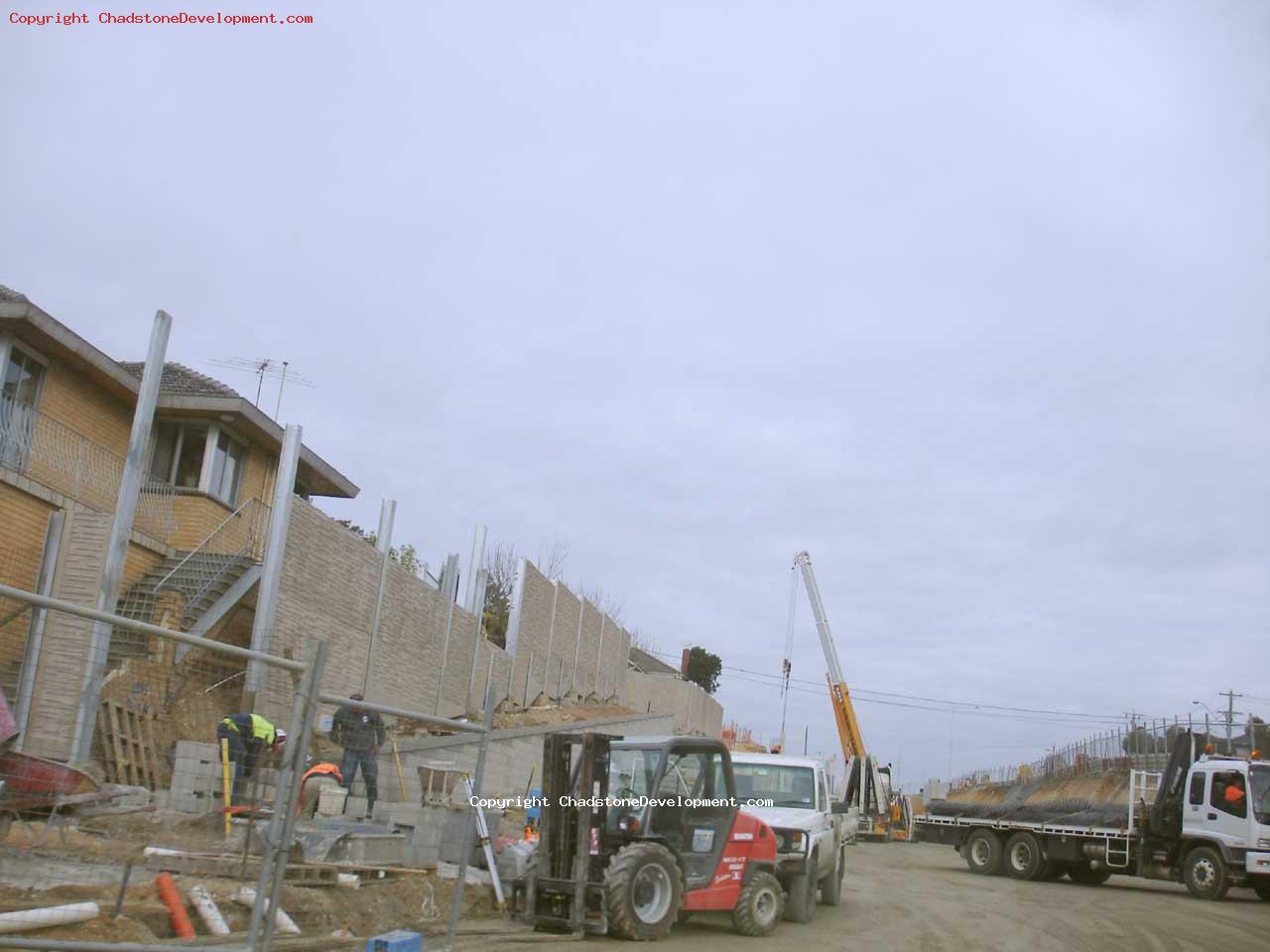 Work on the new retaining brick wall along the walkway - Chadstone Development Discussions