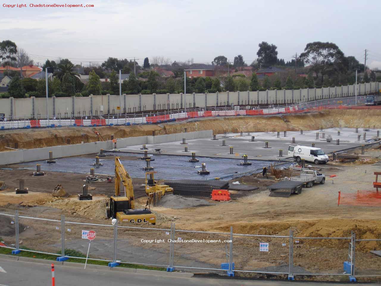 Closeup of foundation laying - Chadstone Development Discussions