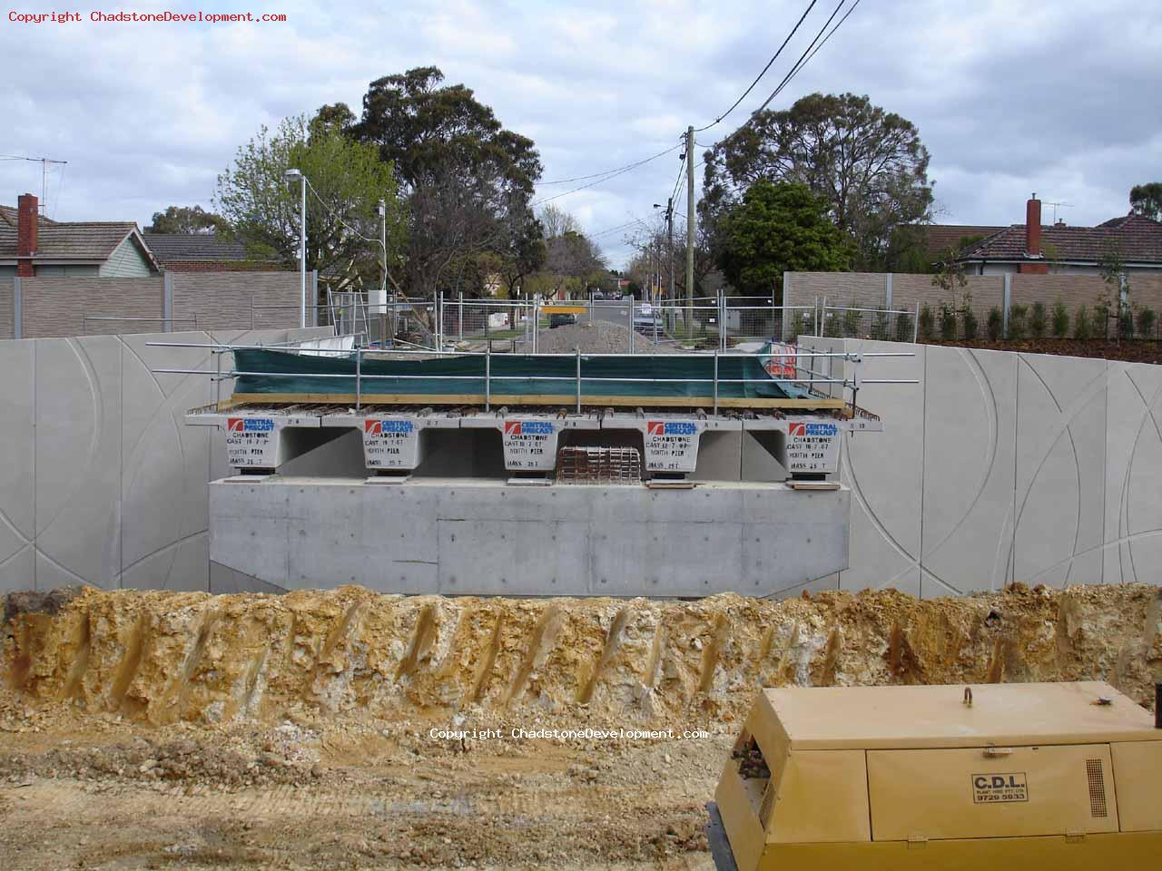 A generator/compressor sits near the Webster St bridge - Chadstone Development Discussions