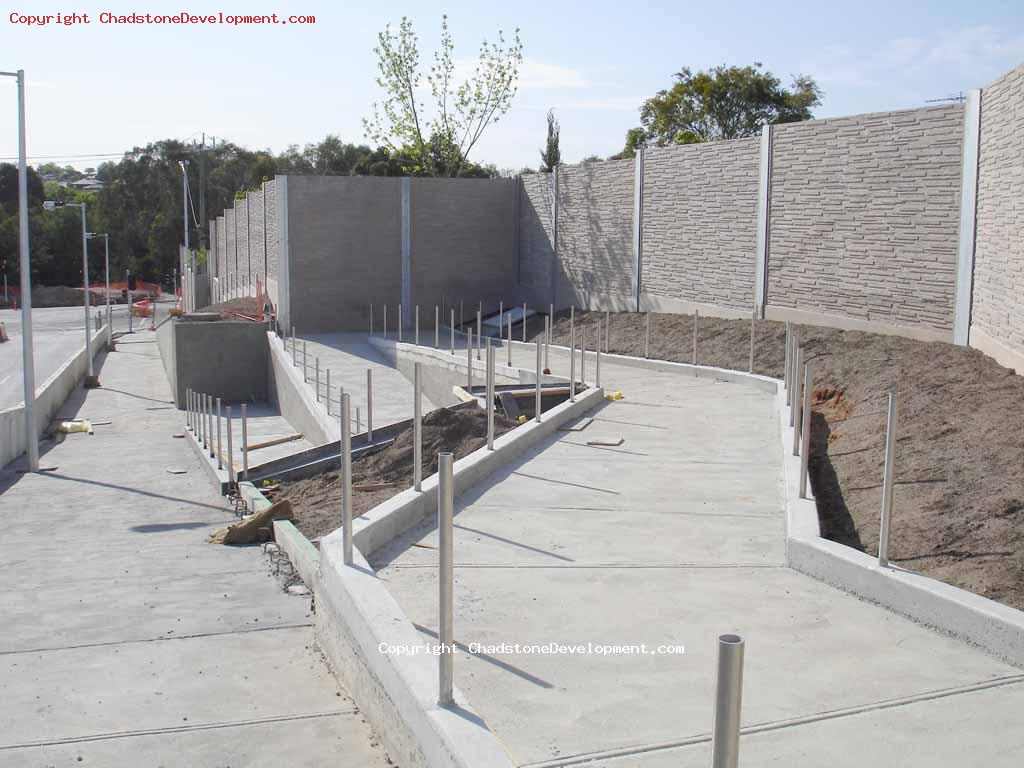 Metal poles along the low-gradient footpath ramp - Chadstone Development Discussions
